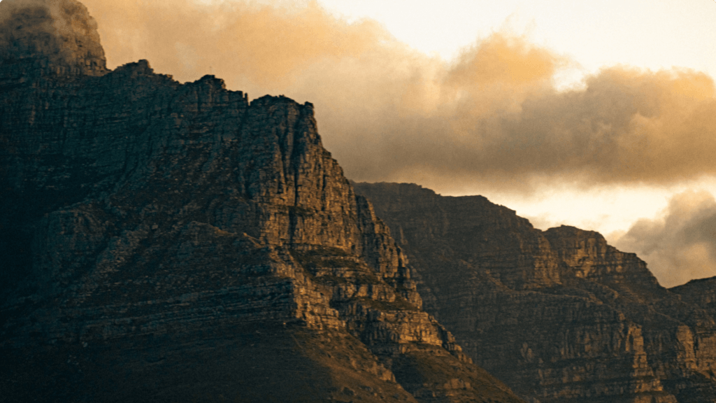 Photograph of mountains in the sunlight, representing hearing God's voice.